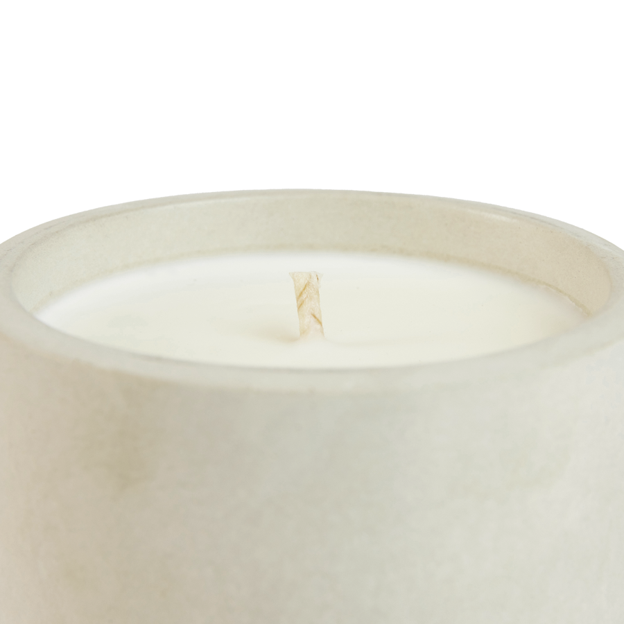 Non-GMO soy wax candle by Erewhon, featuring Yuzu Hinoki aroma in cement jar.